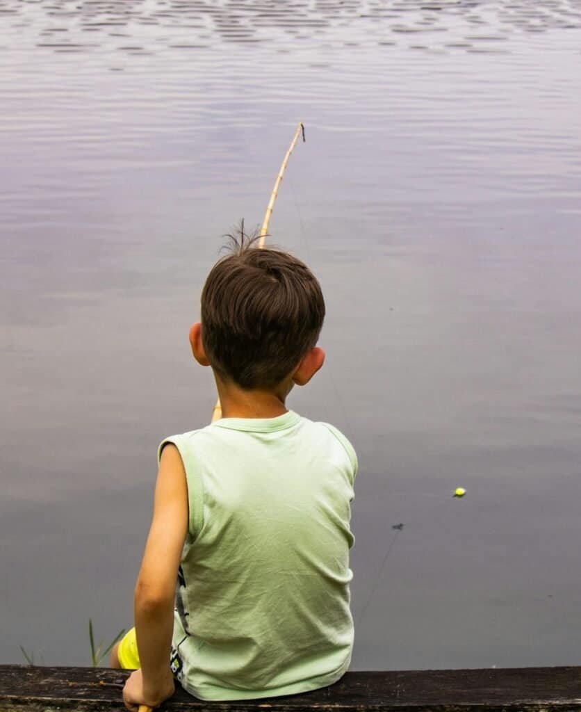 Fun and Engaging Kids Camping Activities, child fishing